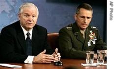 Defense Secretary Robert Gates (l)and Joint Chiefs Chairman Gen. Peter Pace brief reporters at the Pentagon, 7 Mar 2007